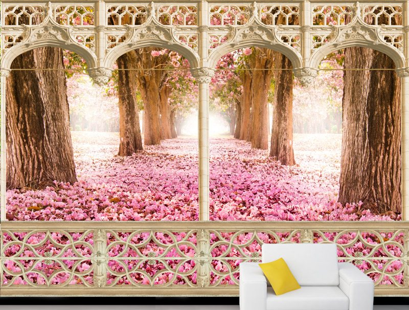 Balcony with a view of a path covered with pink flowers