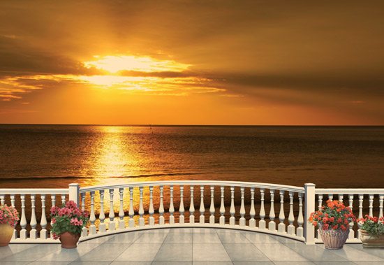 Balcony with spectacular view of the sunset at the sea