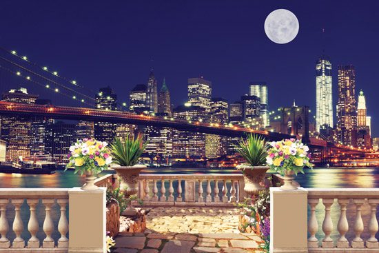 Wallpaper of a balcony with a view of New York on a full moon night