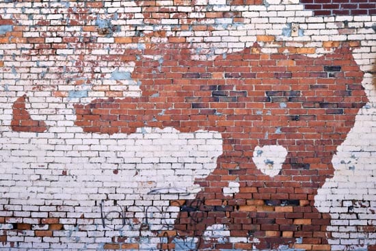 Wallpaper | A brick wall in brown and white color